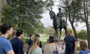 Image of students around a statue of Field Mashal Sir John Dill at the Arlington National Cemetery