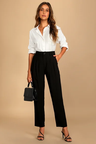 Image of a female dressed in professional white shirt and black pants.